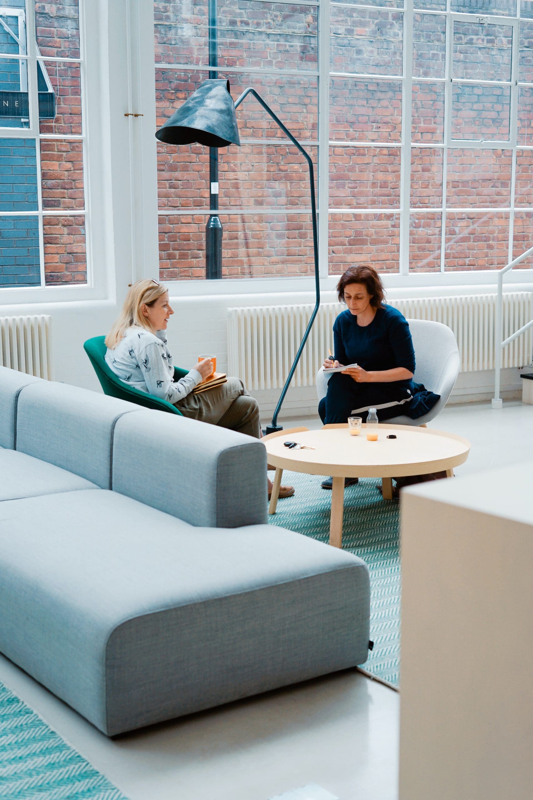 women discussing business